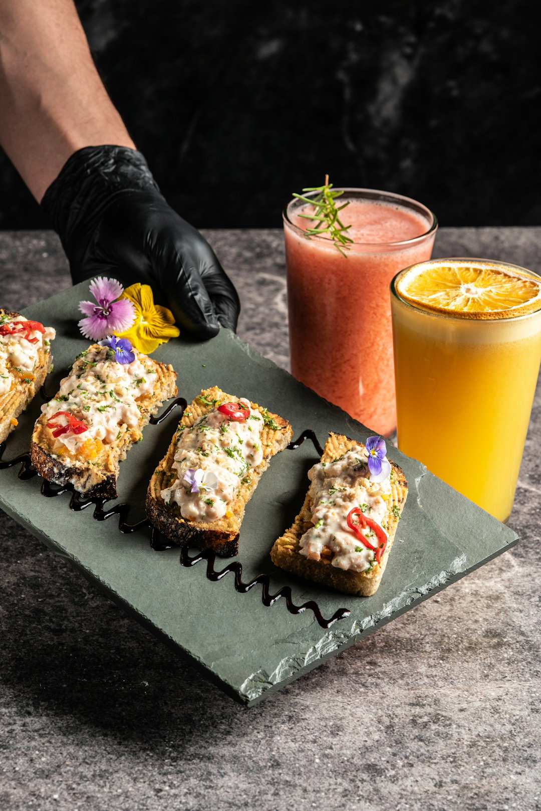 toasted-bread-topped-with-food-and-garnishes.jpg Toasted bread topped with food and garnishes